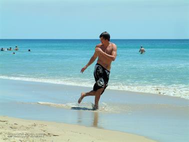 Scimming the wave at Scarborough Beach, Western Australia